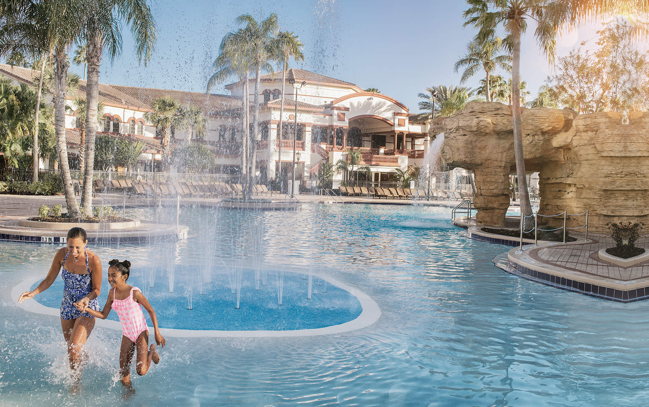 Mom and Daughter in Resort Pool